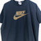 NIKE Center Swoosh Logo T-Shirt Spellout