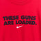 NIKE Swoosh These Guns Are Loaded T-Shirt