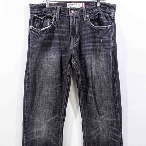 Levis 527 Low BootCut Distressed Jeans