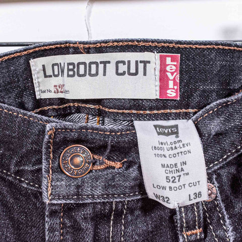 Levis 527 Low BootCut Distressed Jeans