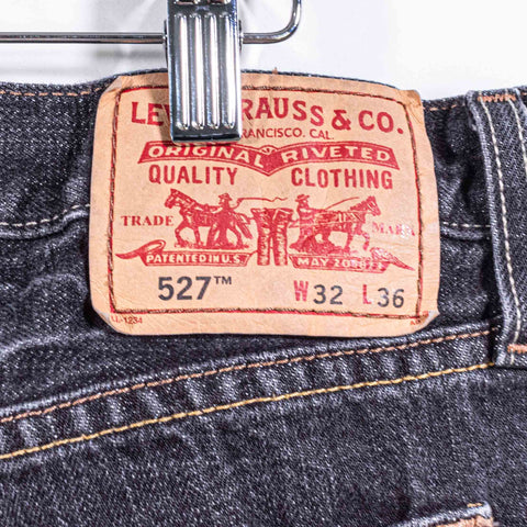 Levis 527 Low BootCut Distressed Jeans
