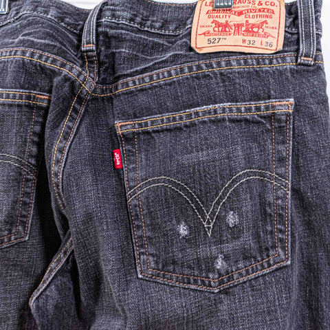 Levis 527 Low BootCut Distressed Jeans