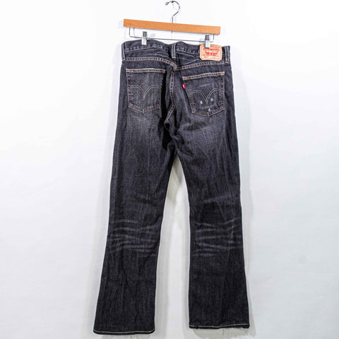 Levis 527 Low BootCut Distressed Jeans