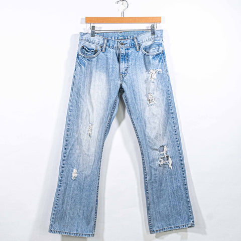 Levis 527 Bootcut Distressed Jeans