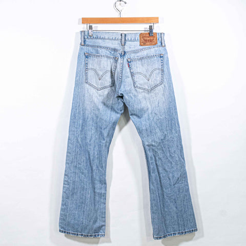 Levis 527 Bootcut Distressed Jeans