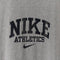 NIKE Athletics Center Swoosh T-Shirt